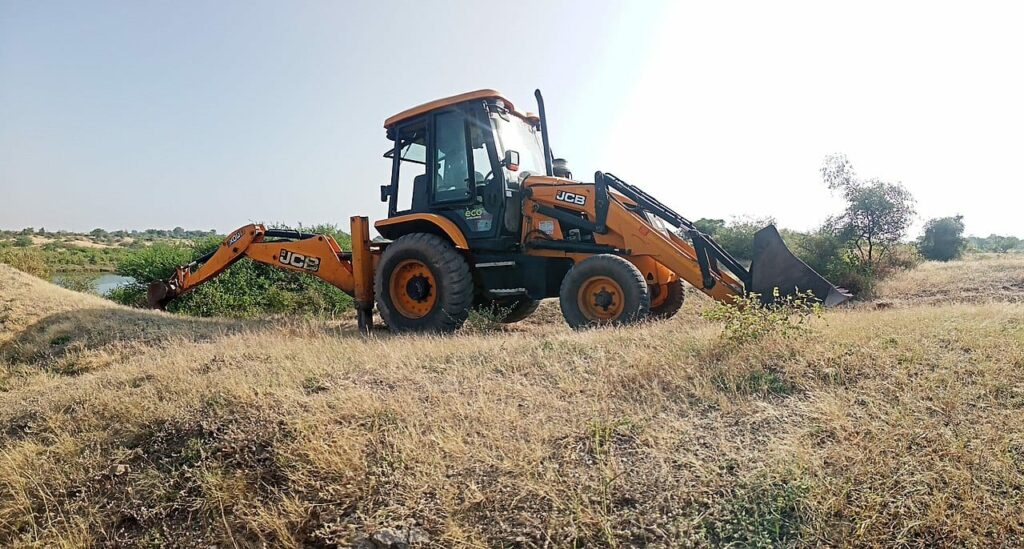 backhoe loader used in land clearing