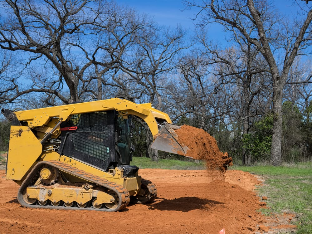 skid steer loader used in land clearing